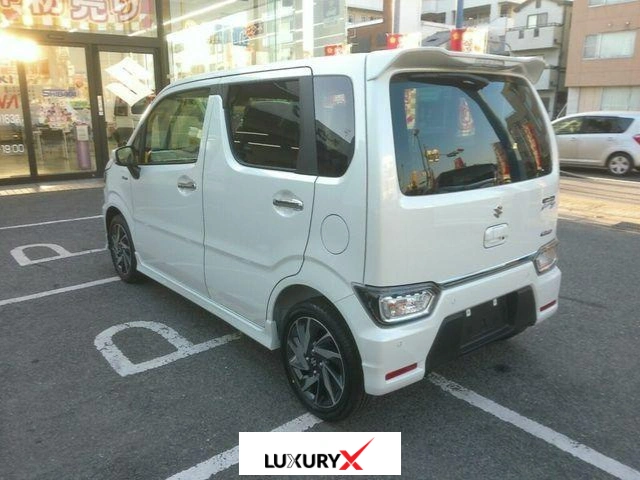 Front view of Suzuki Wagon R Custom Z Hybrid ZX 2025 in Pearl White