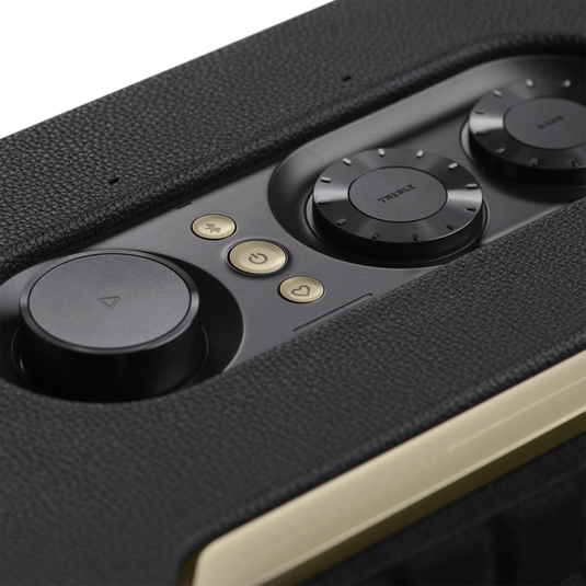 Portable JBL Authentic 300 speaker playing music outdoors